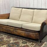 Early 20th century leather club sofa - seat and back in modern fabric
