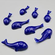 Set of 6 vintage blue porcelain whale knife rests.