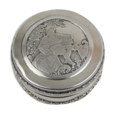 Small round box with silver pills