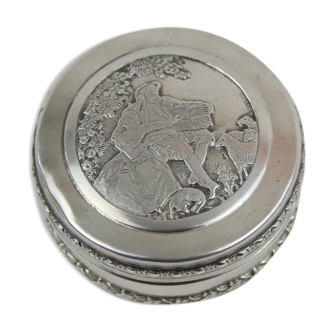 Small round box with silver pills