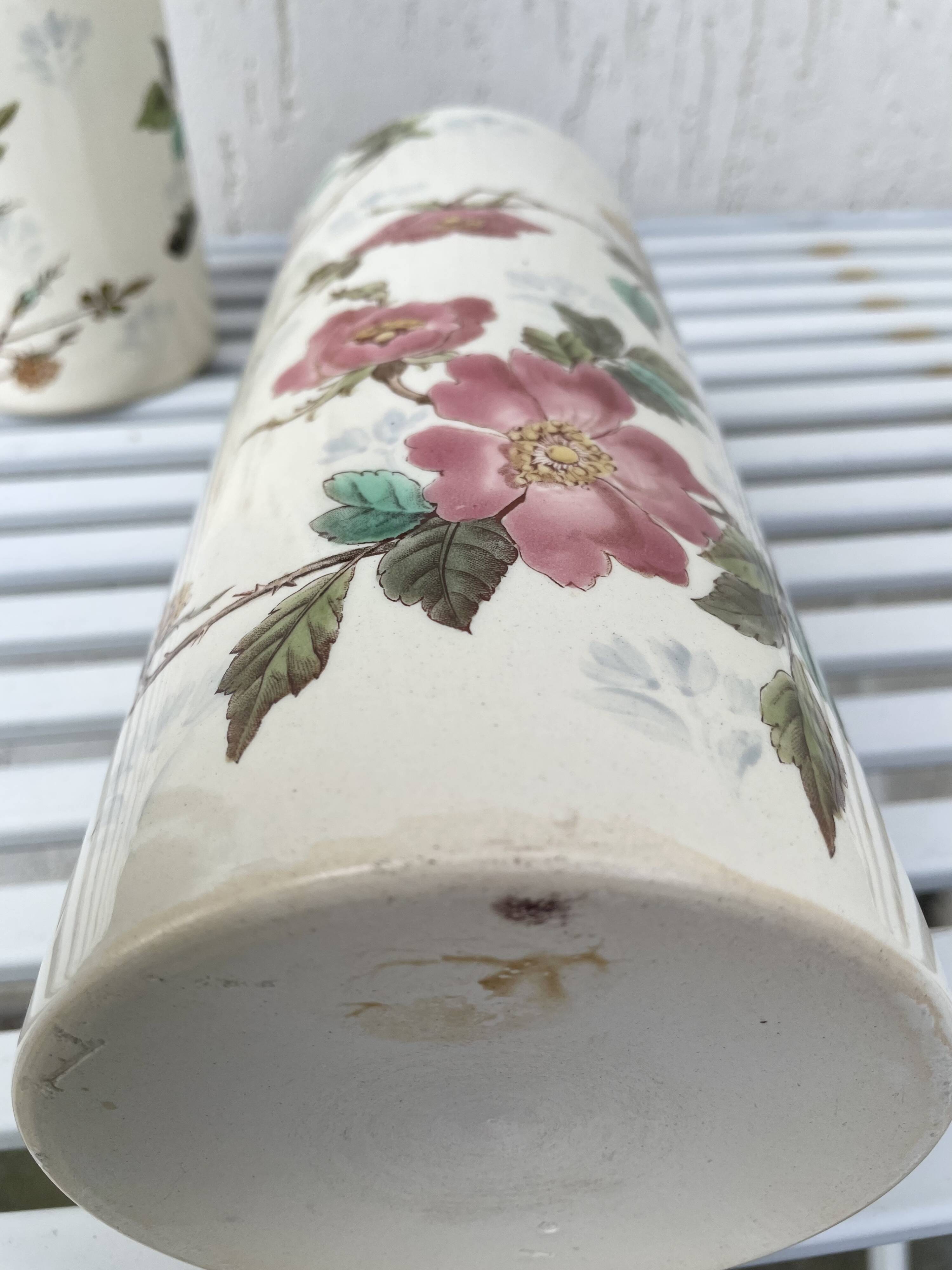 Roller vases in earthenware with floral decoration of wild rose, circa 1930–1950.