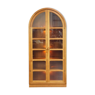 Elegant vintage Danish display cabinet with glass panels and atmospheric lighting