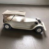 Lacquered wooden car and Vilac Aroutcheff fabric