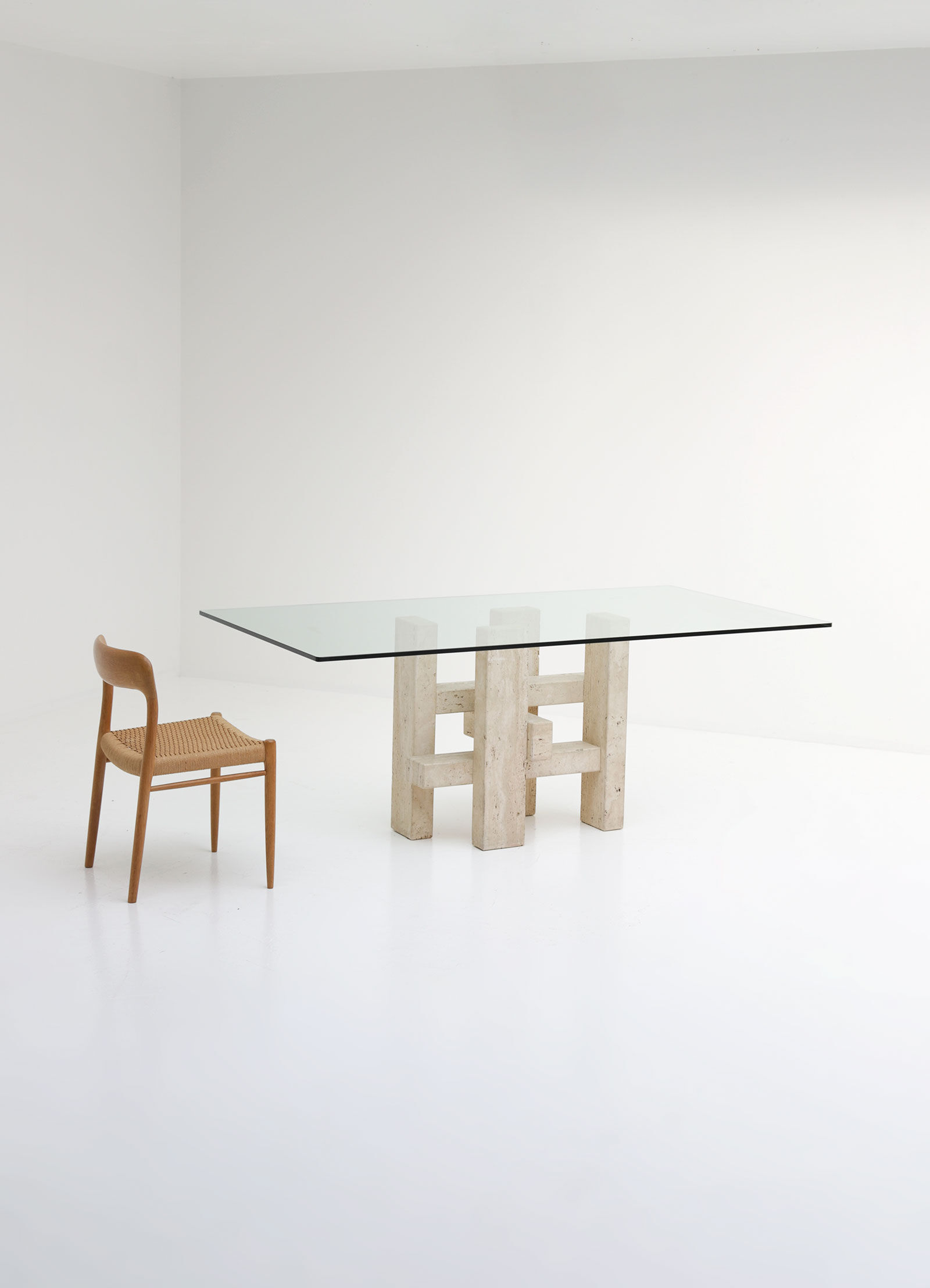 Travertine dining table by Willy Ballez