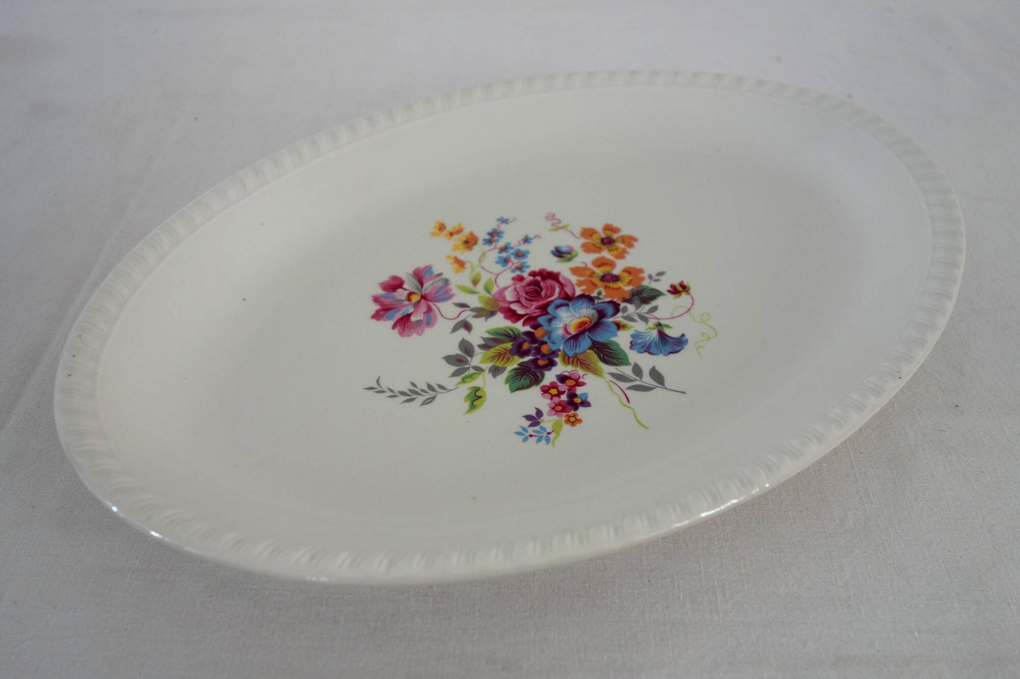 Serving dishes with floral decoration, vintage Luneville FG