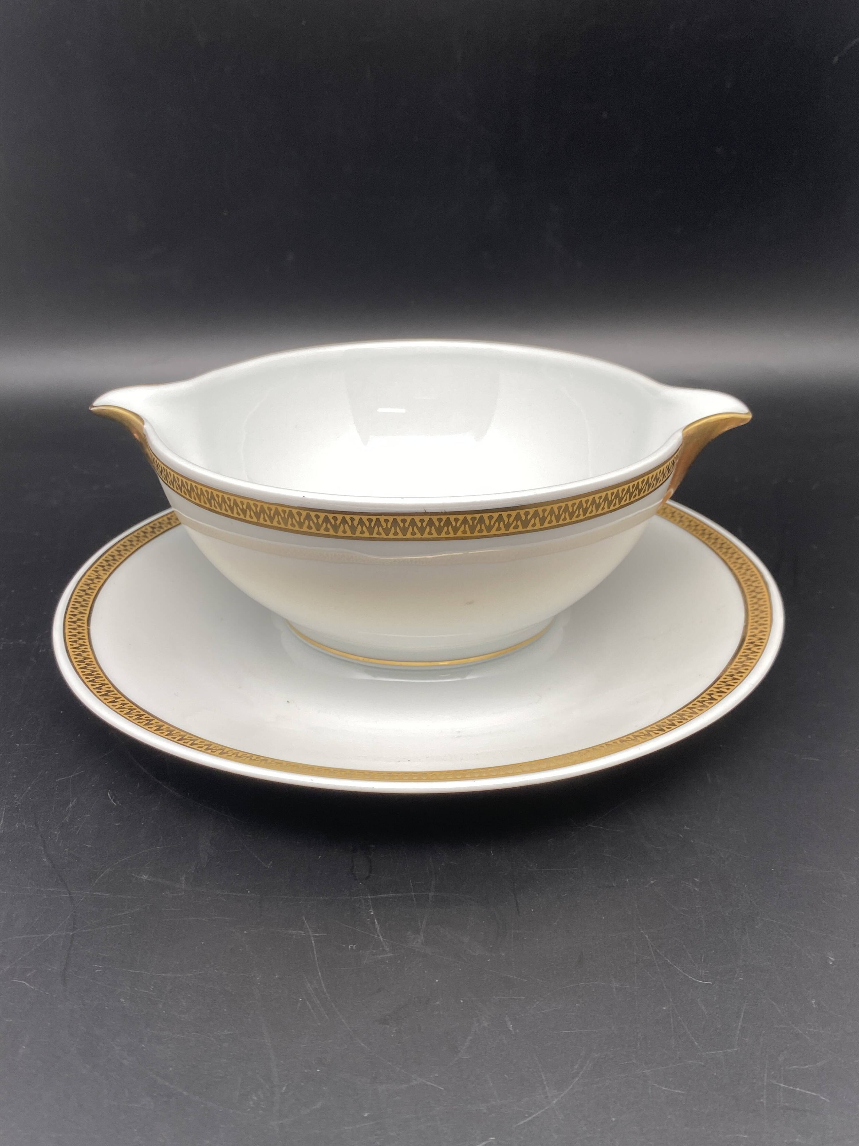 Limoges porcelain gravy boat with gold edging