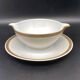 Limoges porcelain gravy boat with gold edging