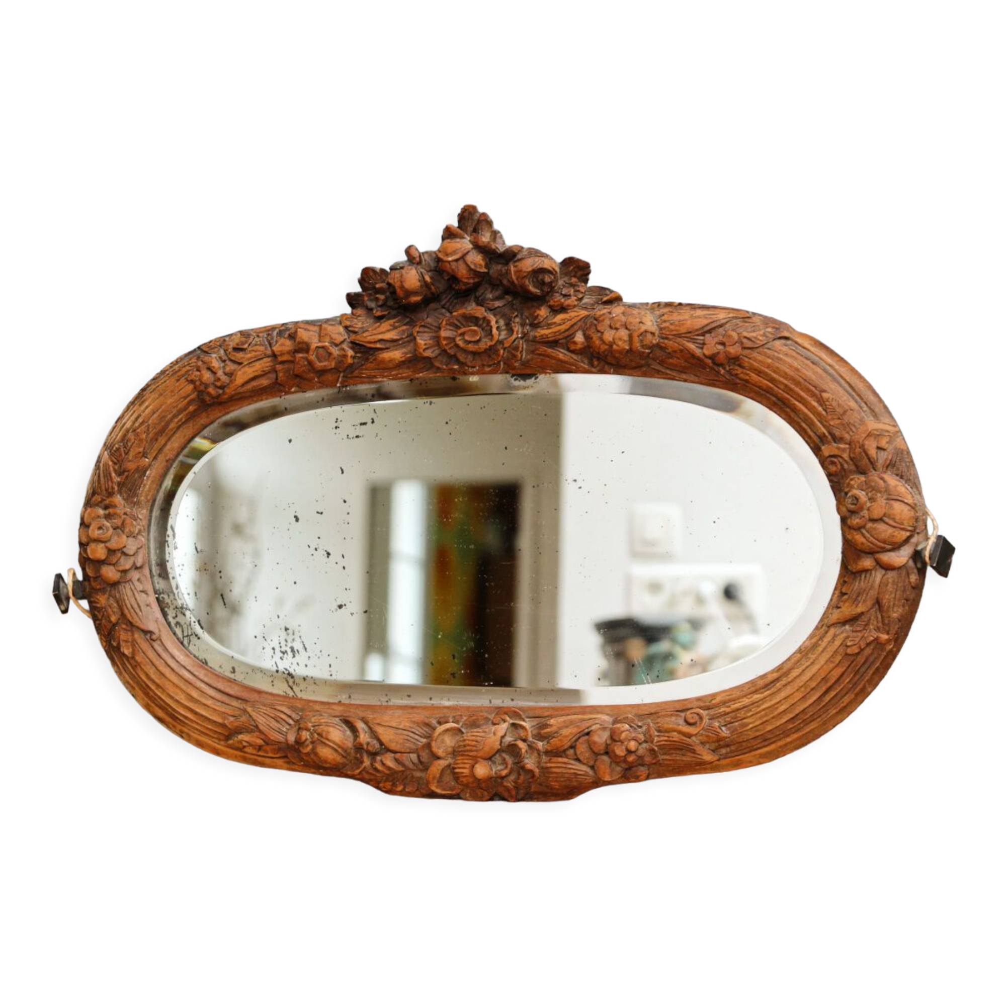 Beveled mirror in carved wood