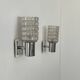 Pair of vintage wall lights, chromed metal and pressed molded glass, Italy, 1970