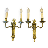 Appliques Louis XVI en bronze doré époque XIXe surmontées de Flambeaux