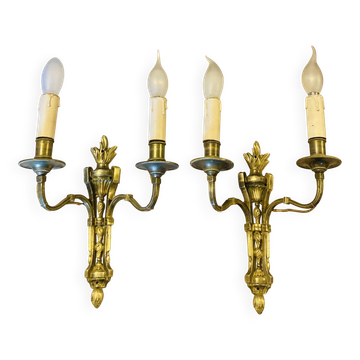 Louis XVI wall sconces in gilded bronze from the 19th century topped with torches.
