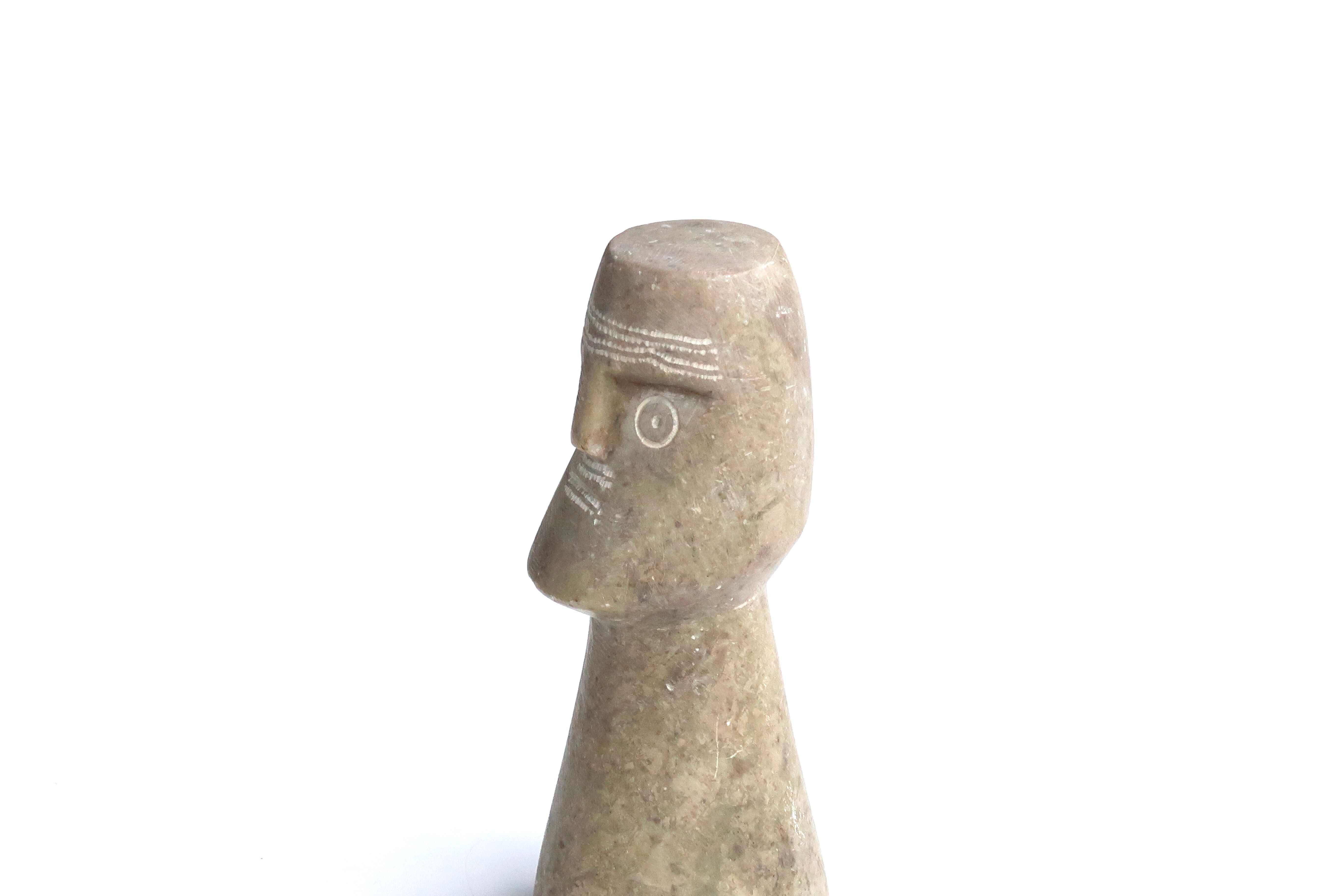 Ethnic stone bust, 70s
