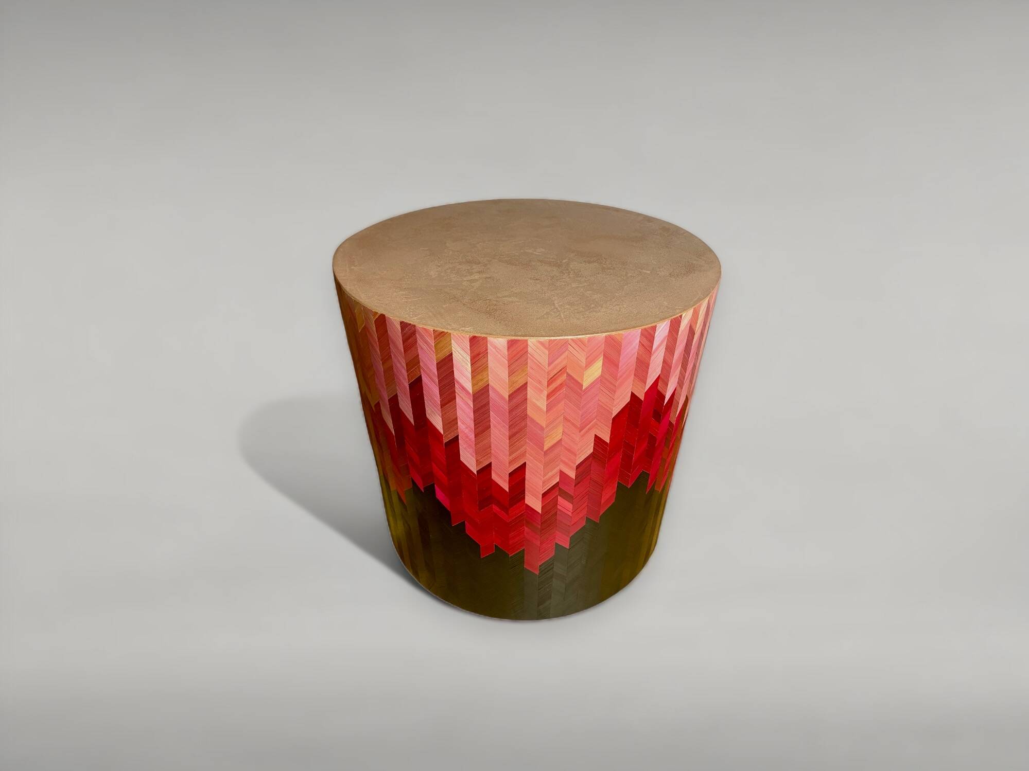 Side table with straw/inlaid concrete.