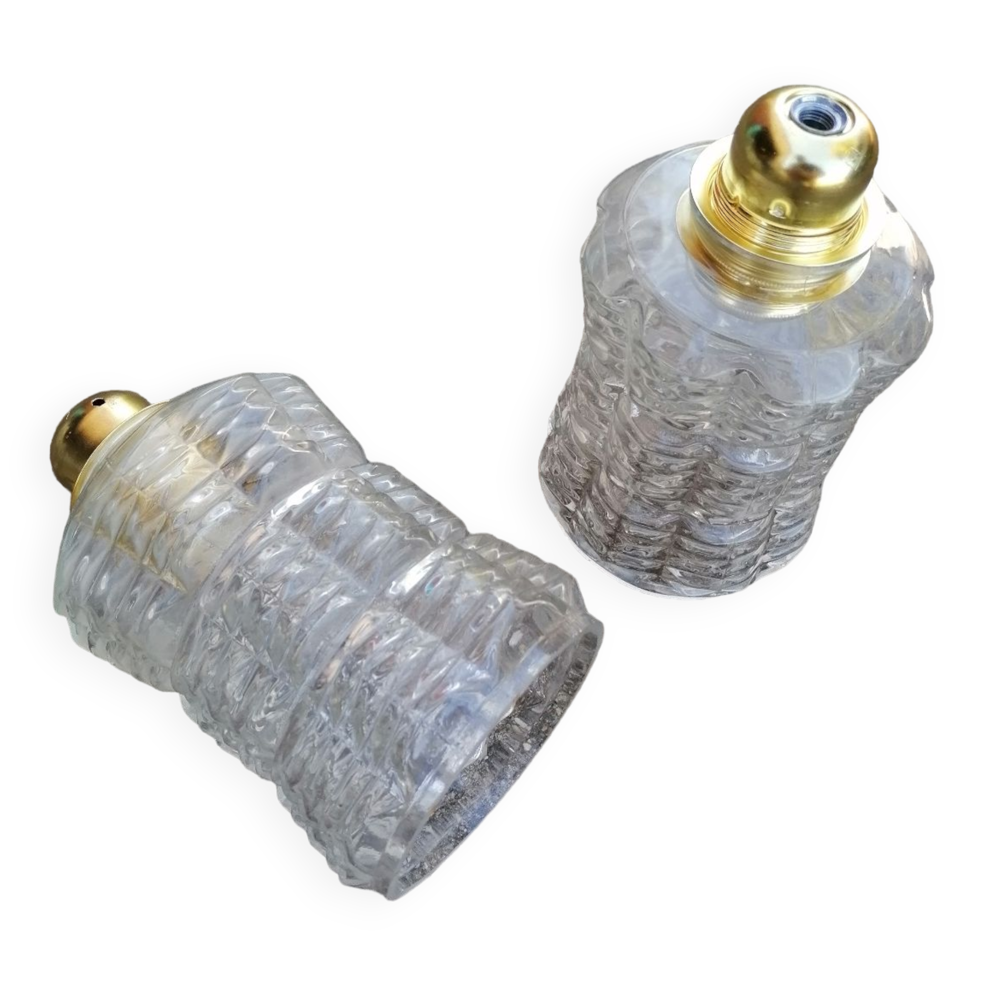 Duo of vintage molded glass globe pendant lights.