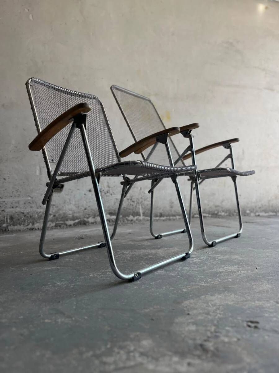 Set of two vintage folding chairs with an aluminium wire frame.