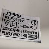 Two purple hanging lamps from Norway Says for Muuto, model Mhy