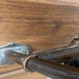 Vintage turned wood and rattan magazine rack