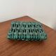 Vintage woven green ceramic trivet from the 70s, handmade.