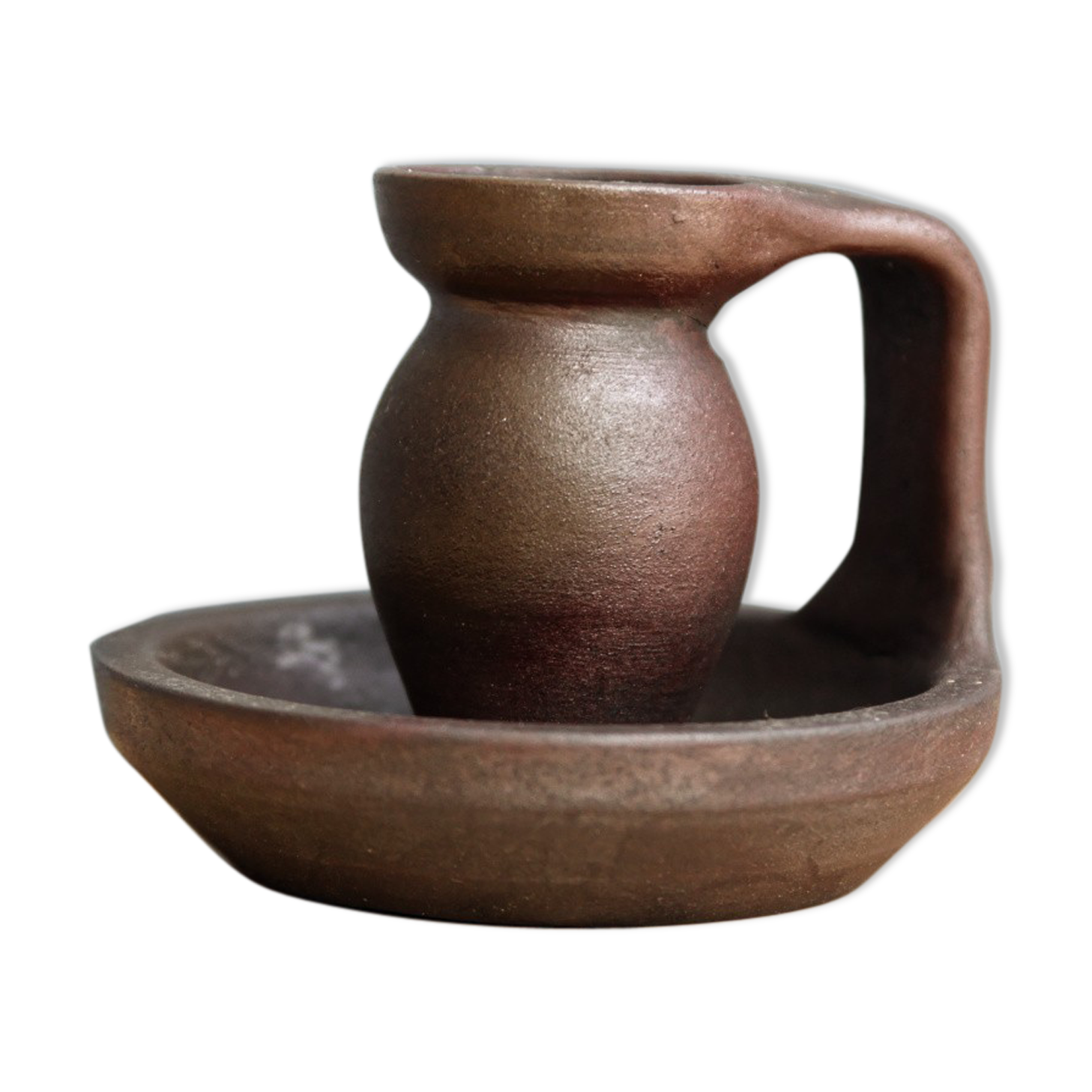 Small hand-held candlestick, signed