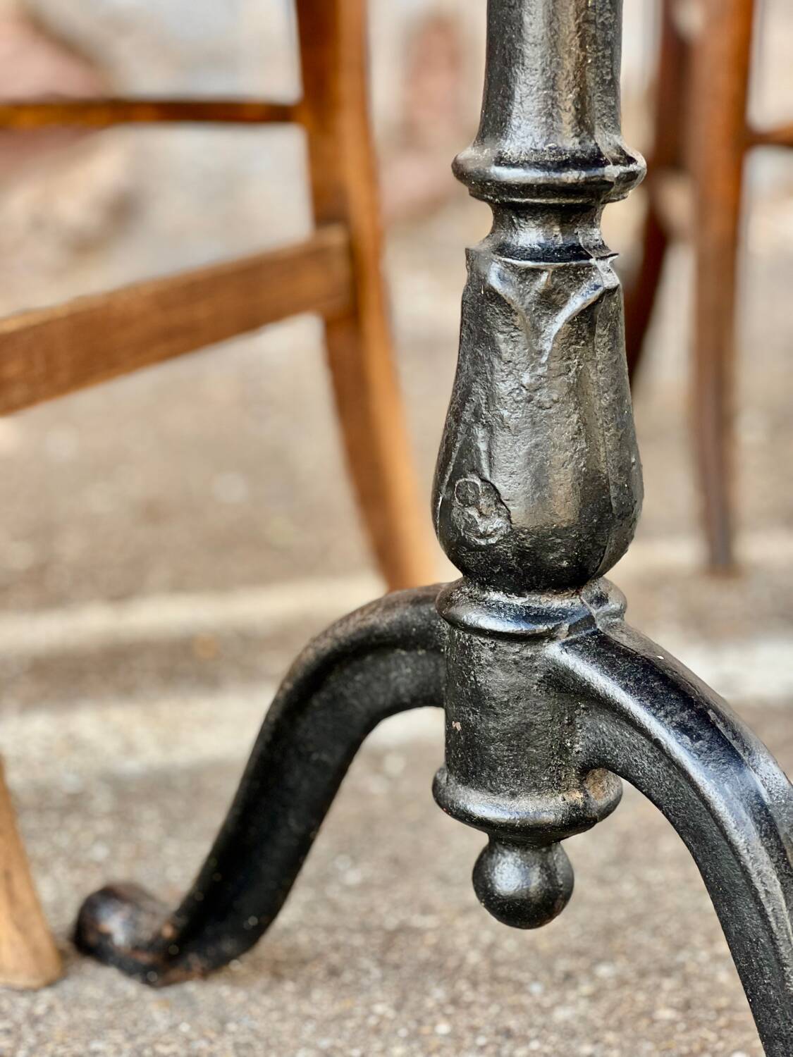 Antique bistro table with cast iron legs