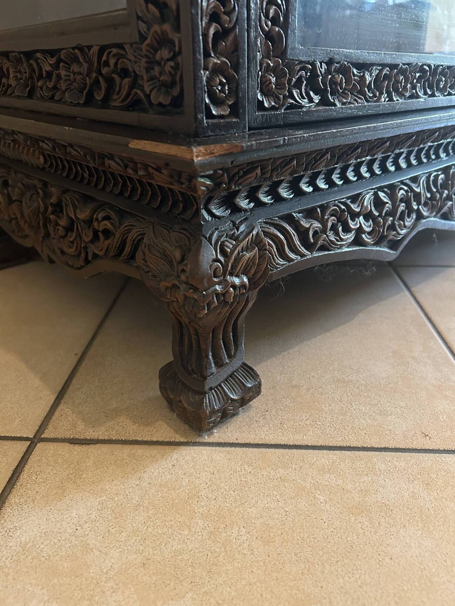 Thai trapezoidal display cabinet in carved solid wood