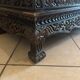 Thai trapezoidal display cabinet in carved solid wood