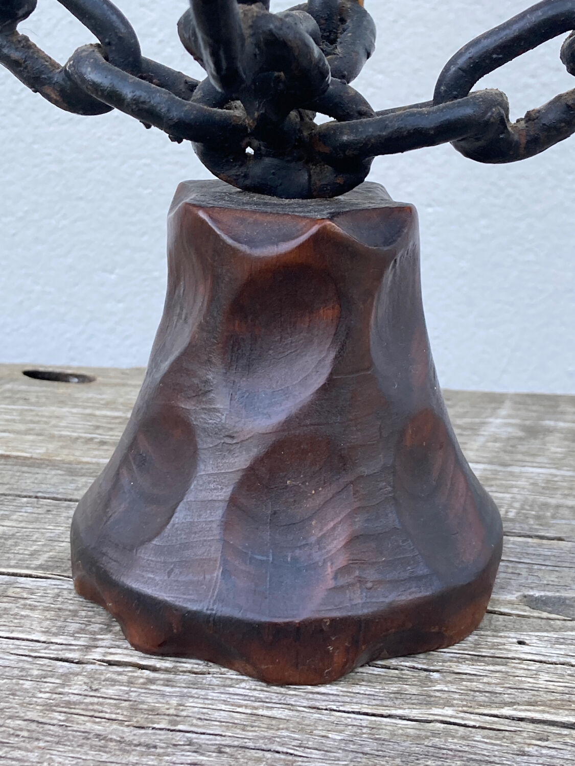 Brutalist iron and wood chain candle holder from the 1970s