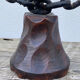 Brutalist iron and wood chain candle holder from the 1970s