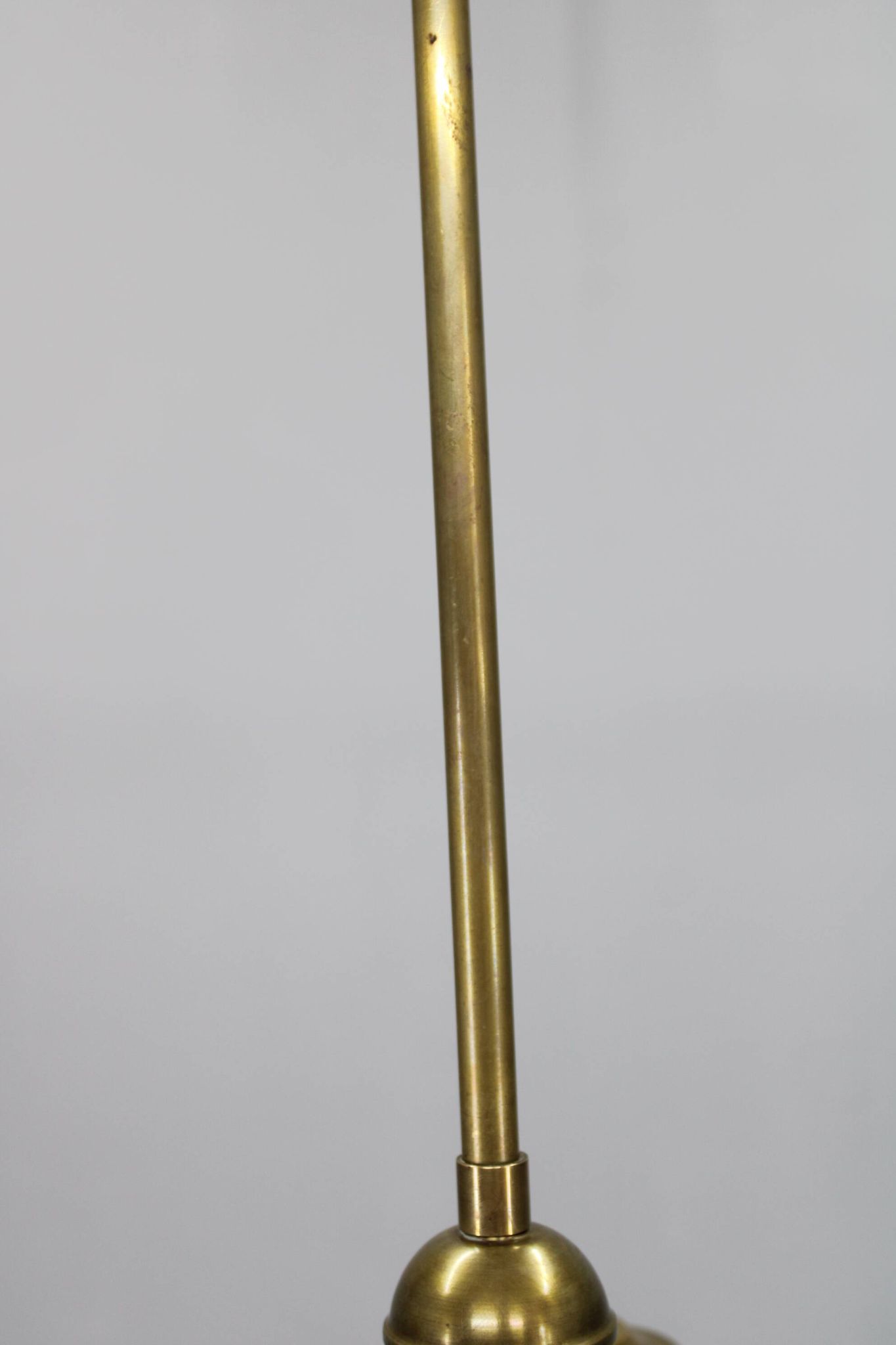 1930s Czechoslovak Art Deco brass chandelier with four opaline glass globes
