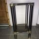 Metal square sellette and 2-storey smoked glass