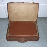 Pair of red suitcases from the 1950s