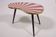 Small kidney-shaped side table with taupe-pink stripes and 3 elegant legs, 50s style