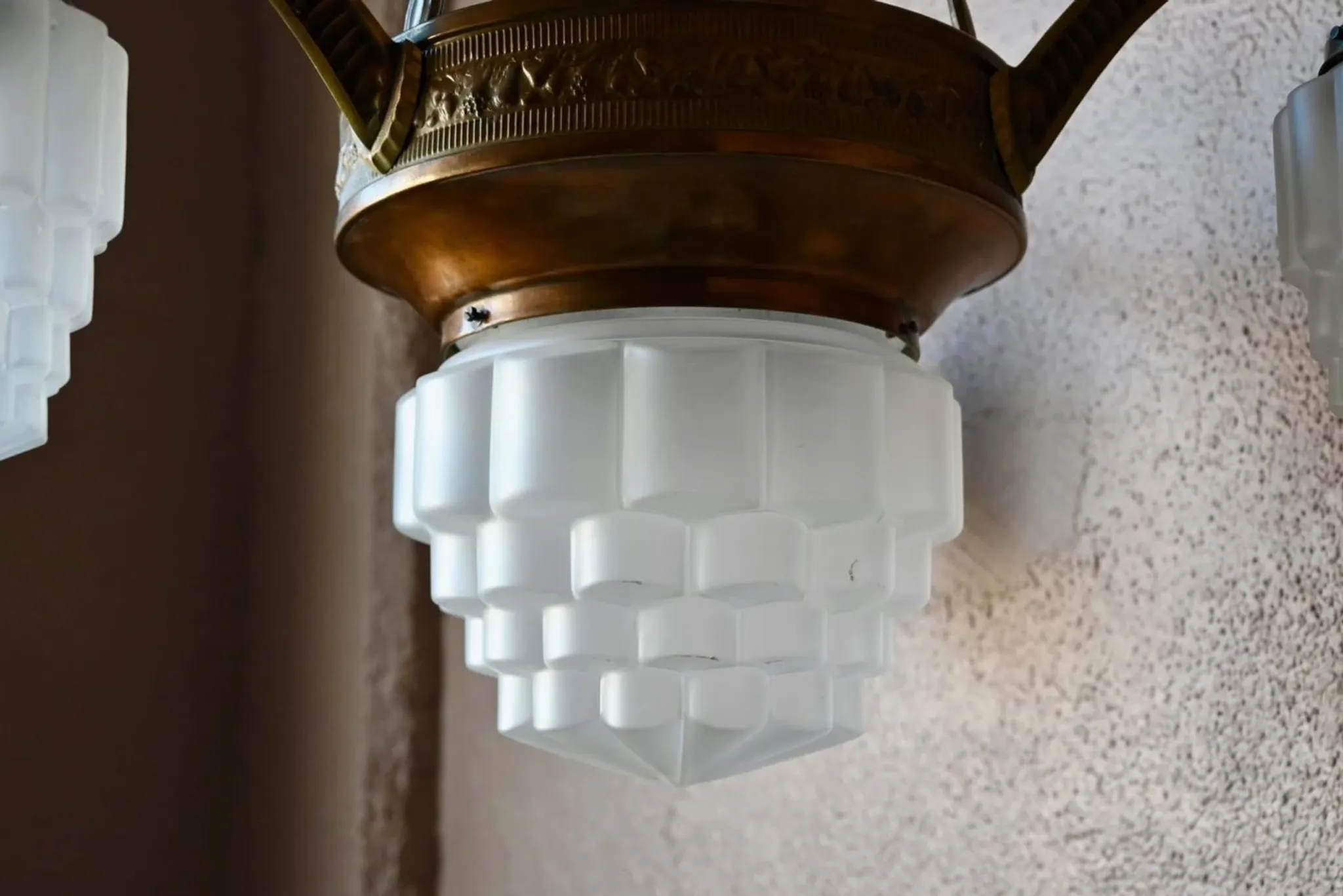 Art Deco lustre in brass and frosted pressed glass from the 1930s.