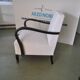 Ivory Art Deco armchair in fabric and dark wood, high back, 1920s-1930s.