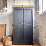 Old wooden locker with black patina