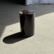 Small side table in black petrified wood with stripes and beige sides H28 D18.