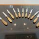 10 couteaux en corne virole en argent