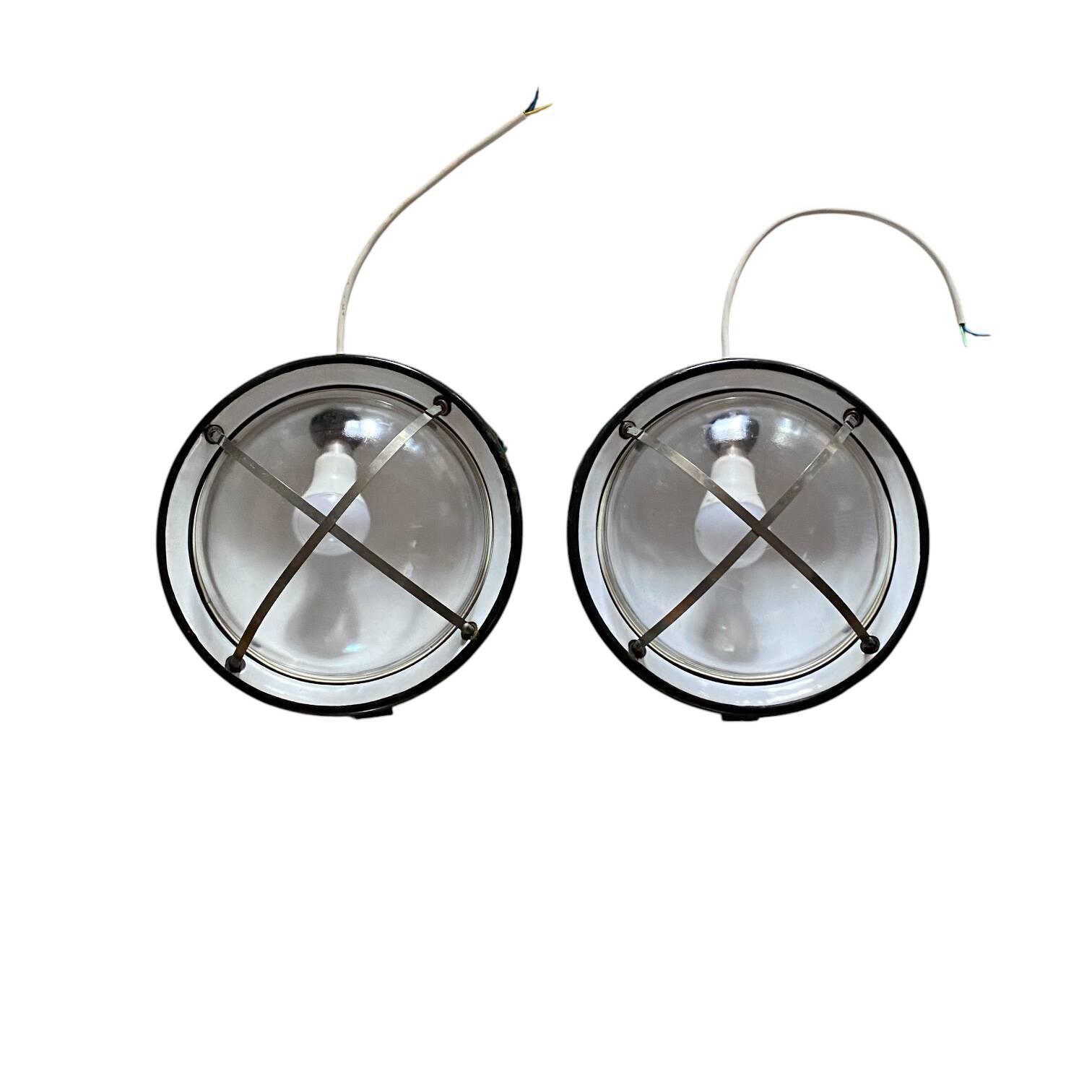 Pair of vintage industrial wall sconces or ceiling lights in enamelled sheet metal.