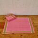 Set of 5 vintage cotton table napkins in pink and green.