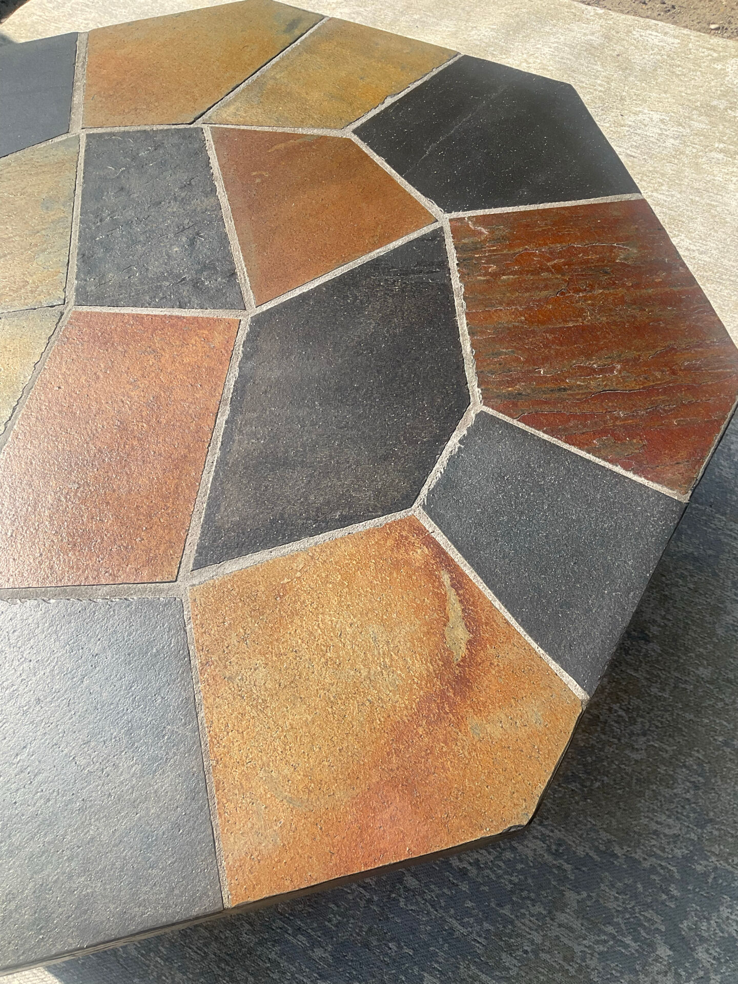 Brutalist octagonal coffee table from the 1970s in solid oak and slate.