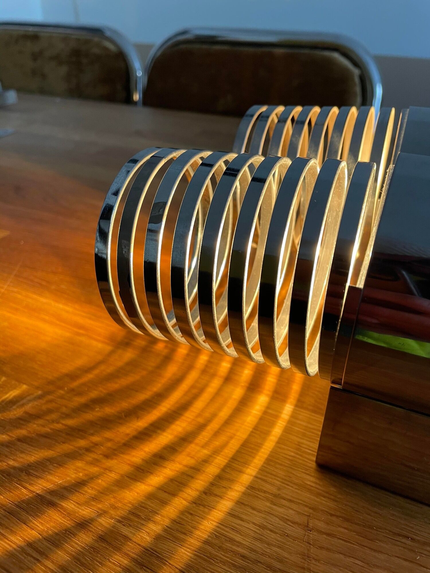Pair of vintage wall lamps "Spring", chromed metal, France 1970