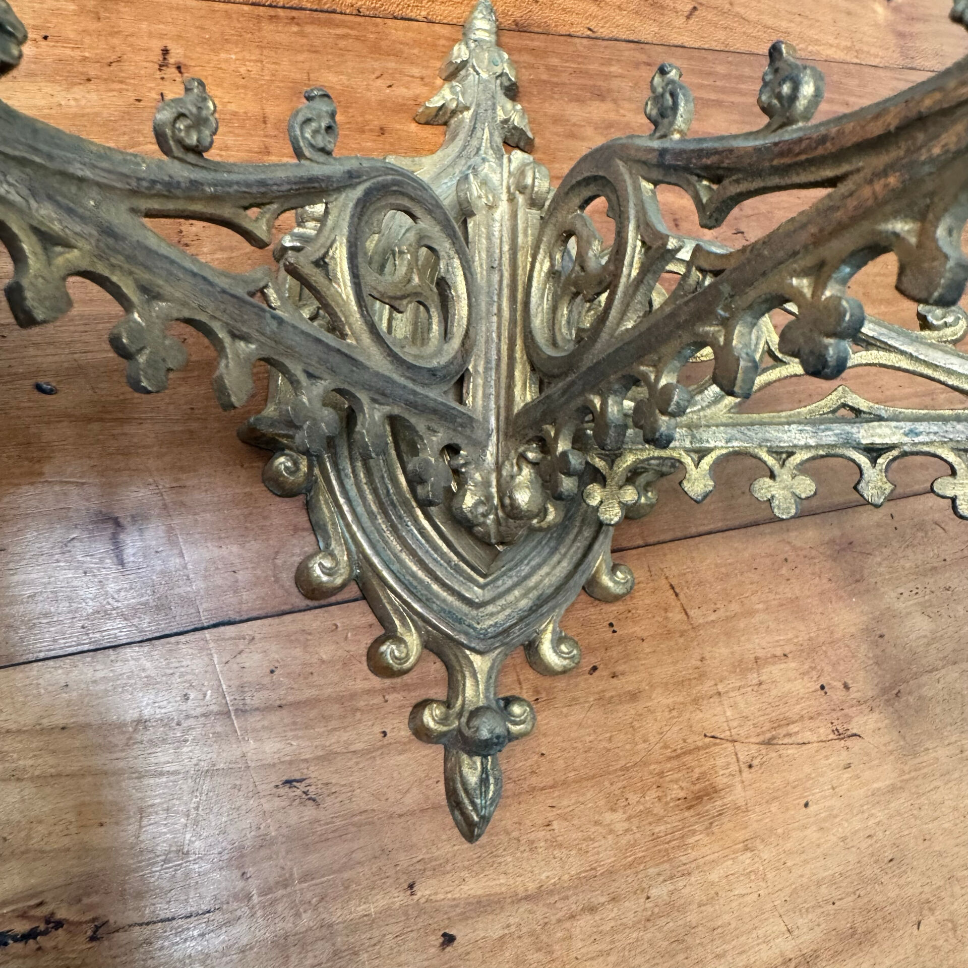 Elegant pair of three-light wall sconces from the 19th century.