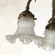 Empire bronze chandelier with 4 lights in glass tulips