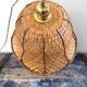Vintage suspension in electrified braided wicker to nine