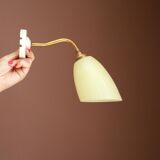 Brass and glass sconce