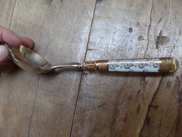 Art Deco silver and porcelain fruit ladle