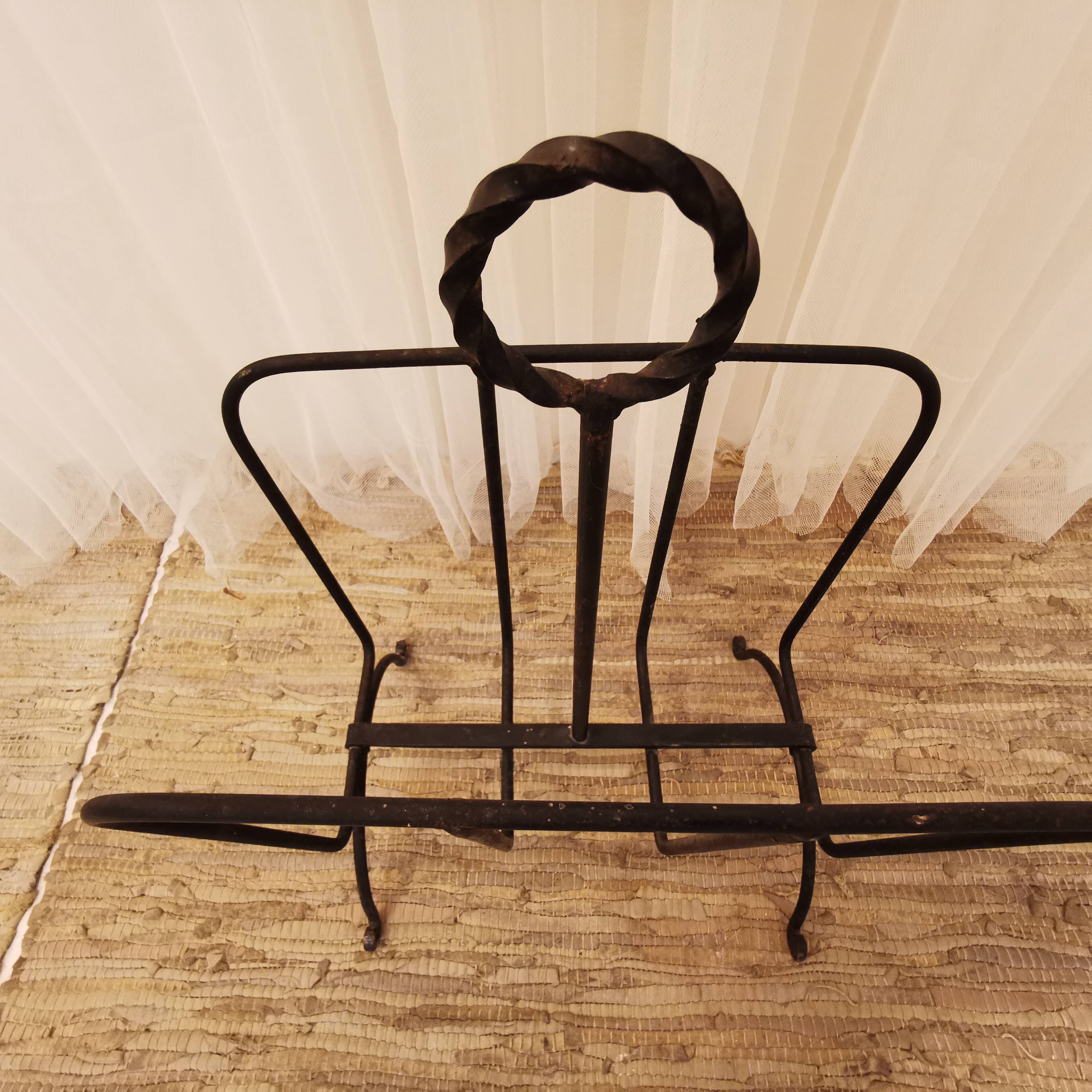 Wrought iron magazine rack