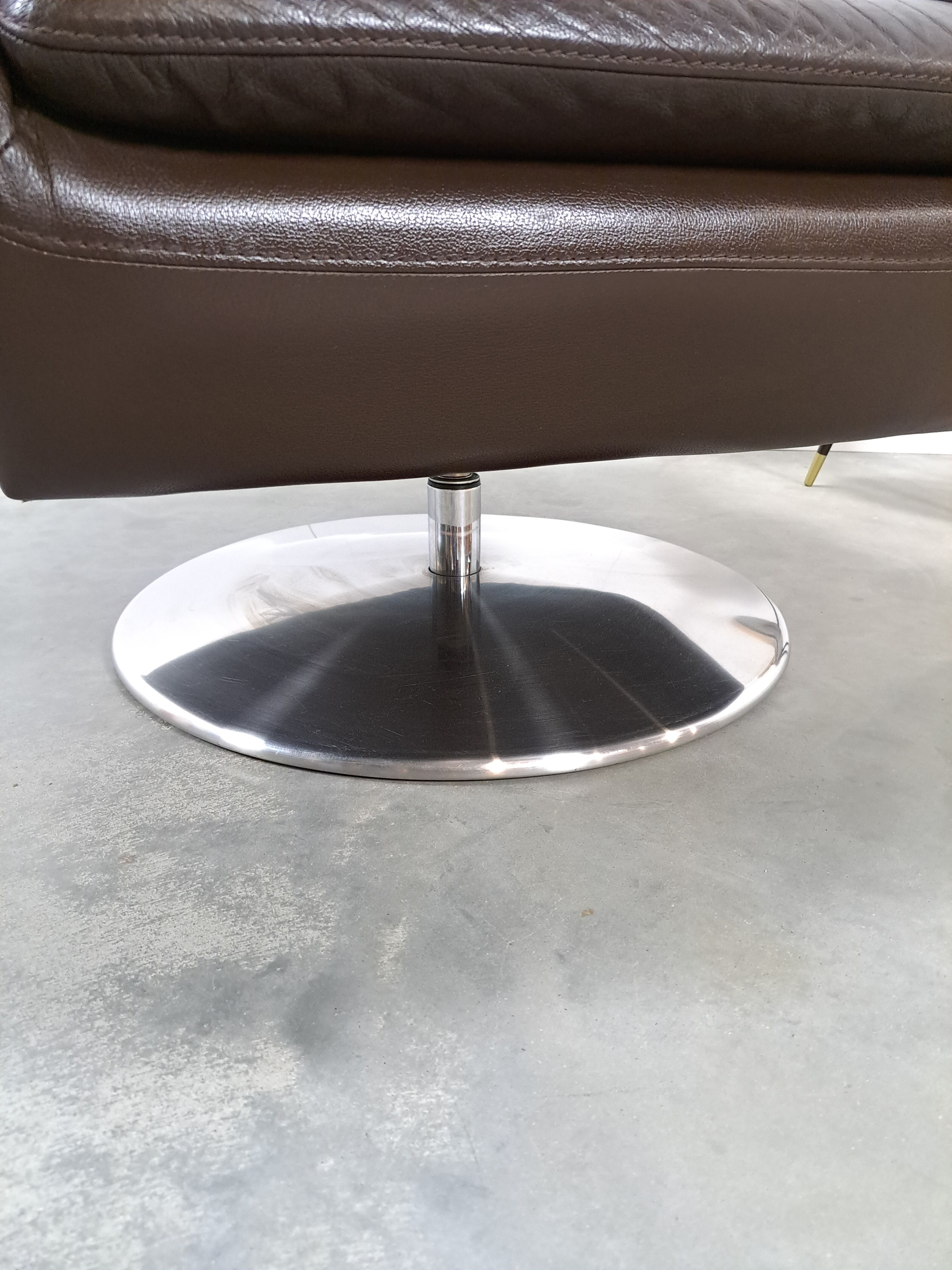 Brown leather swivel chair