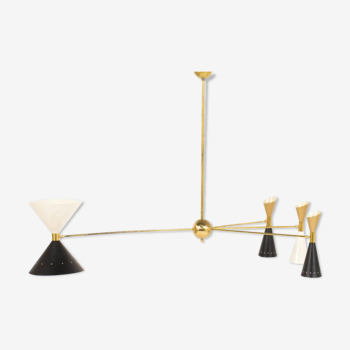 8-light brass chandelier and white-black and gold day blinds