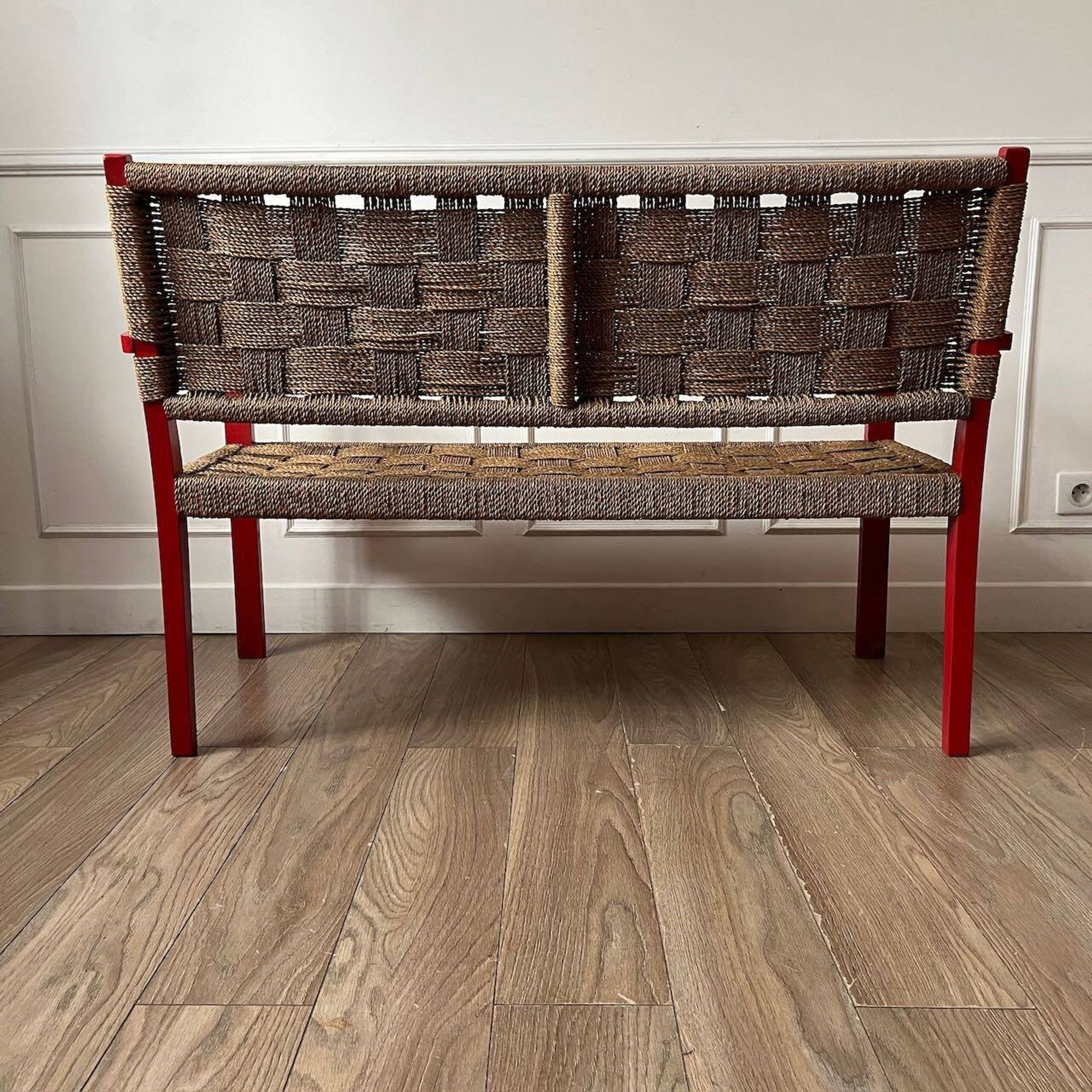 Vintage bench in red wood and rope